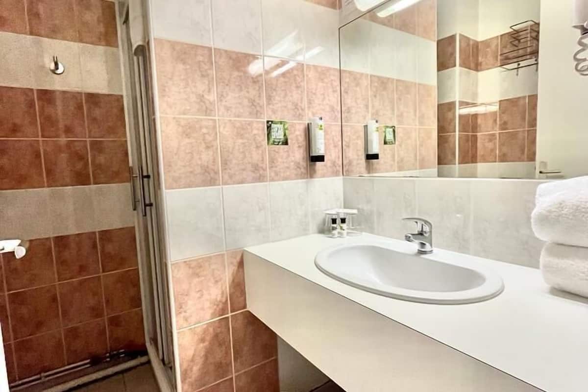 comfort room | bathroom | free toiletries, hair dryer, towels, soap