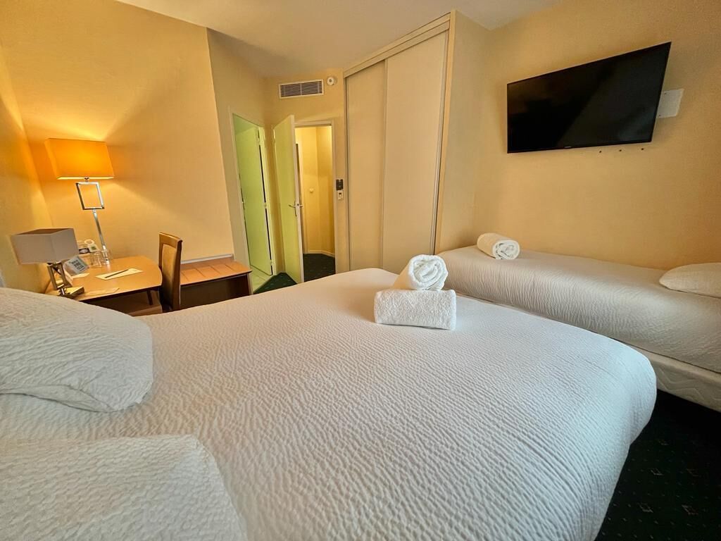 Premium bedding, desk, laptop workspace, blackout curtains