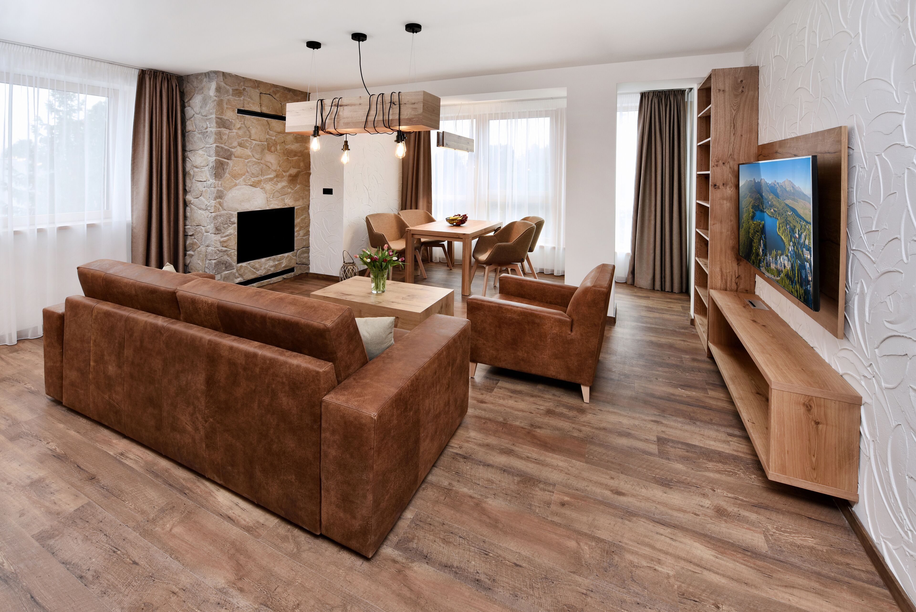 Deluxe Apartment | Living area | 40-inch flat-screen TV with satellite channels, TV, heated floors