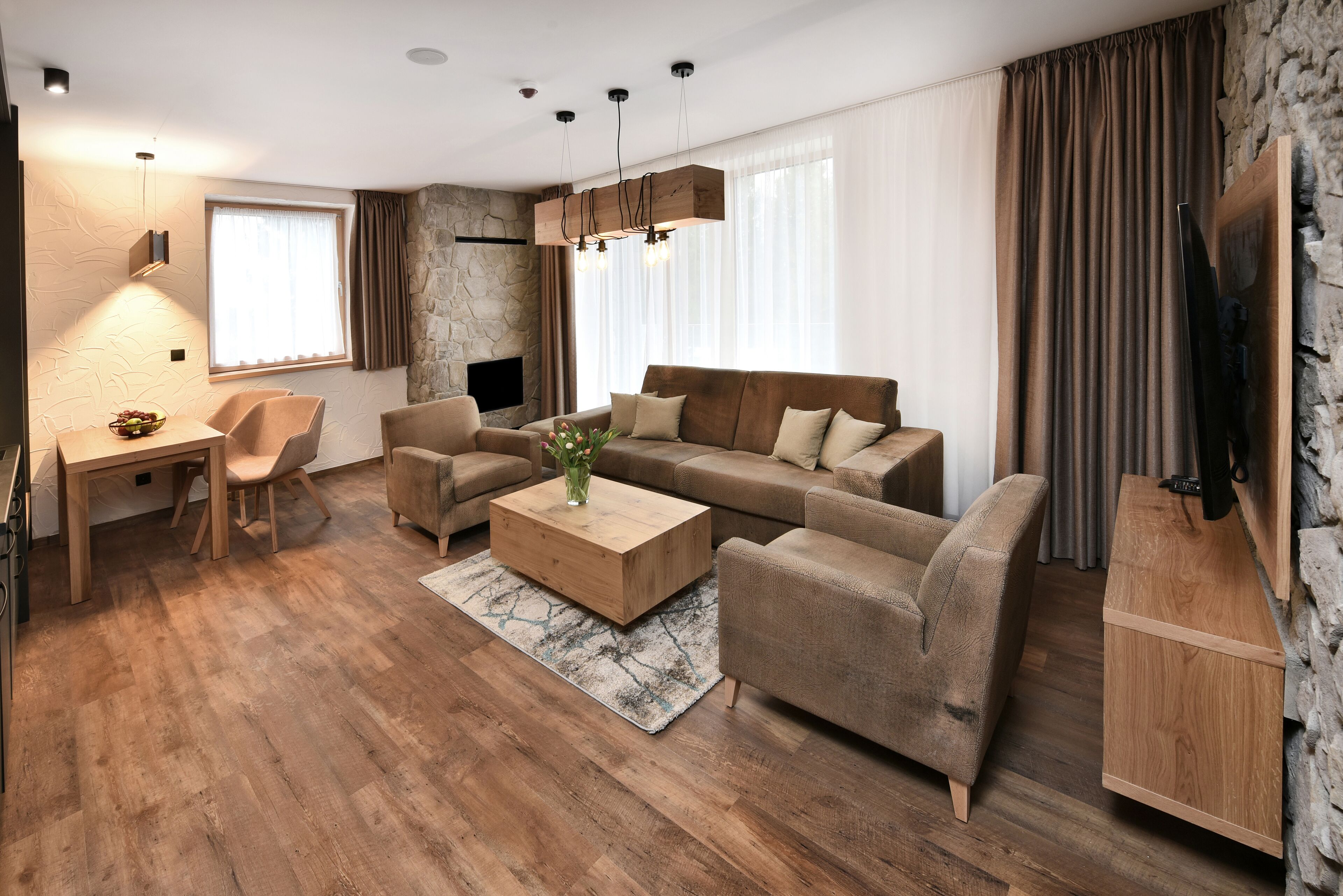 Deluxe Apartment | Living area | 40-inch flat-screen TV with satellite channels, TV, heated floors