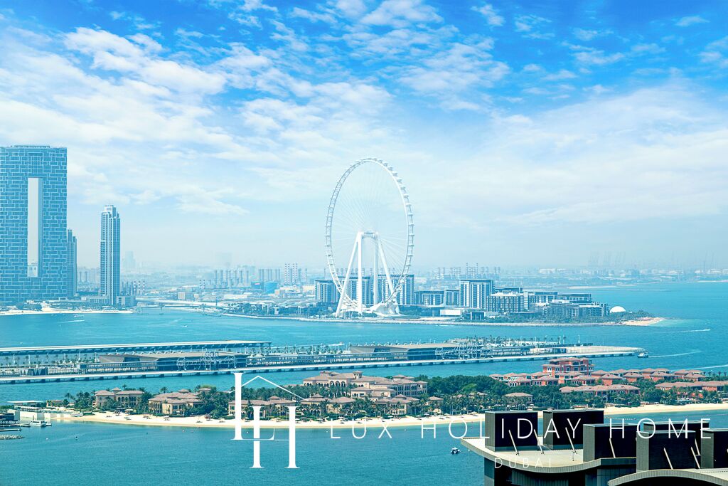 A cityscape with a prominent Ferris wheel, high-rise buildings, and a waterfront.