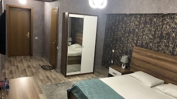 Luxe beddengoed, pillowtop-bedden, een minibar, individueel gedecoreerd