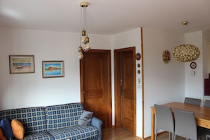 Apartment, 1 Queen Bed with Sofa bed | Living room | 30-inch TV with cable channels