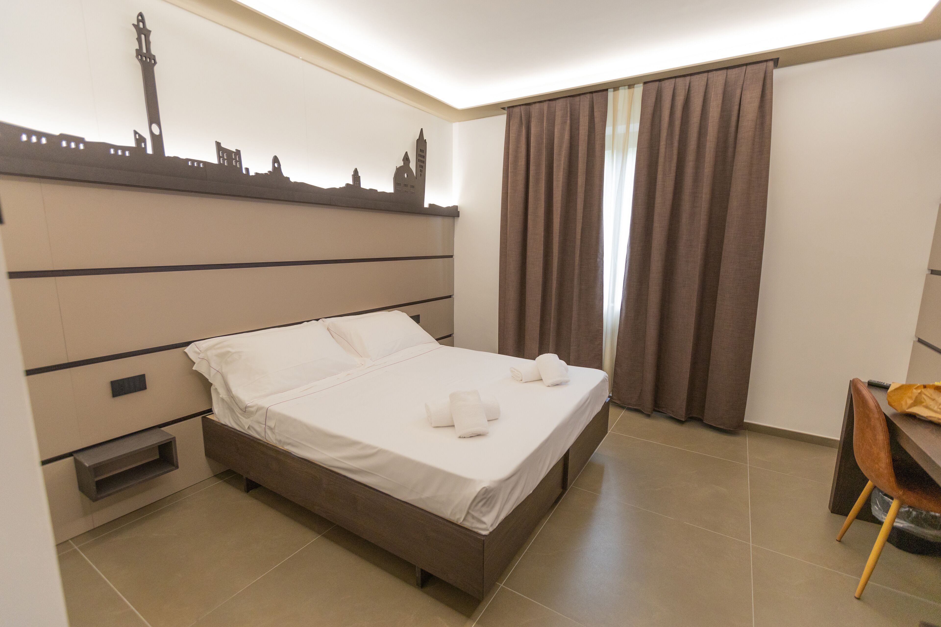 Premium bedding, down duvets, in-room safe, desk