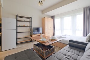 Deluxe appartement, 1 slaapkamer | Geluiddichte muren, gratis wifi, rolstoeltoegankelijk