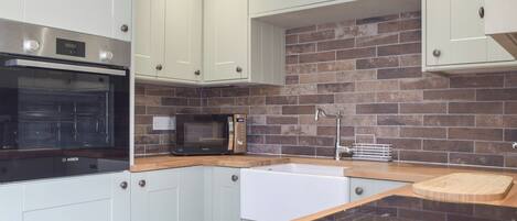 Dishwasher, highchair, cookware/dishes/utensils