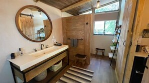 Shower, jetted tub, towels, soap