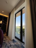 Luxury Double or Twin Room | Minibar, in-room safe, iron/ironing board, free WiFi