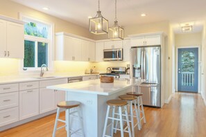 Fridge, microwave, oven, stovetop - 65 Bluff - 4 bedroom 3 bath vacation rental located just steps away from private beach access! (South Haven)