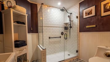 Combined shower/tub, hair dryer, towels, soap