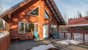 A log cabin with a deck, a fire pit, and a covered outdoor seating area. - Dreamy 2 Bed Cabin #2 - Alaska Kenai Getaway (Sterling)