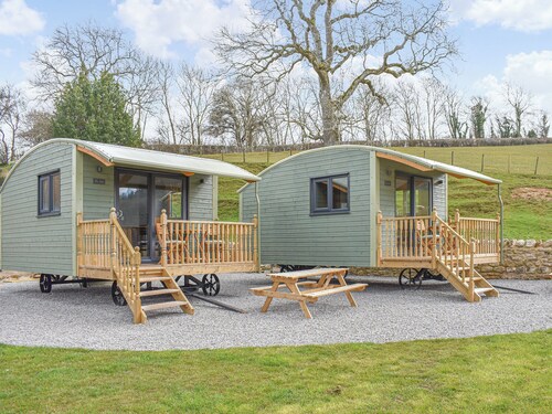 Its a Shepherds Hut underneath with the size and comforts of a pod on top.