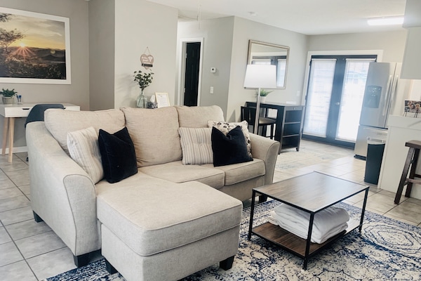Open concept home. Living-room has a Smart TV with blue ray player & DVDs