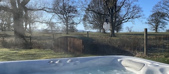 Luxurious shepherds hut with hot tub and pizza oven in the Scottish Trossachs