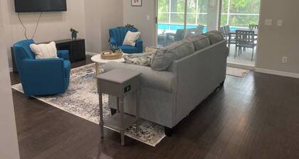 Clean and modern home, sparkling heated pool, near river