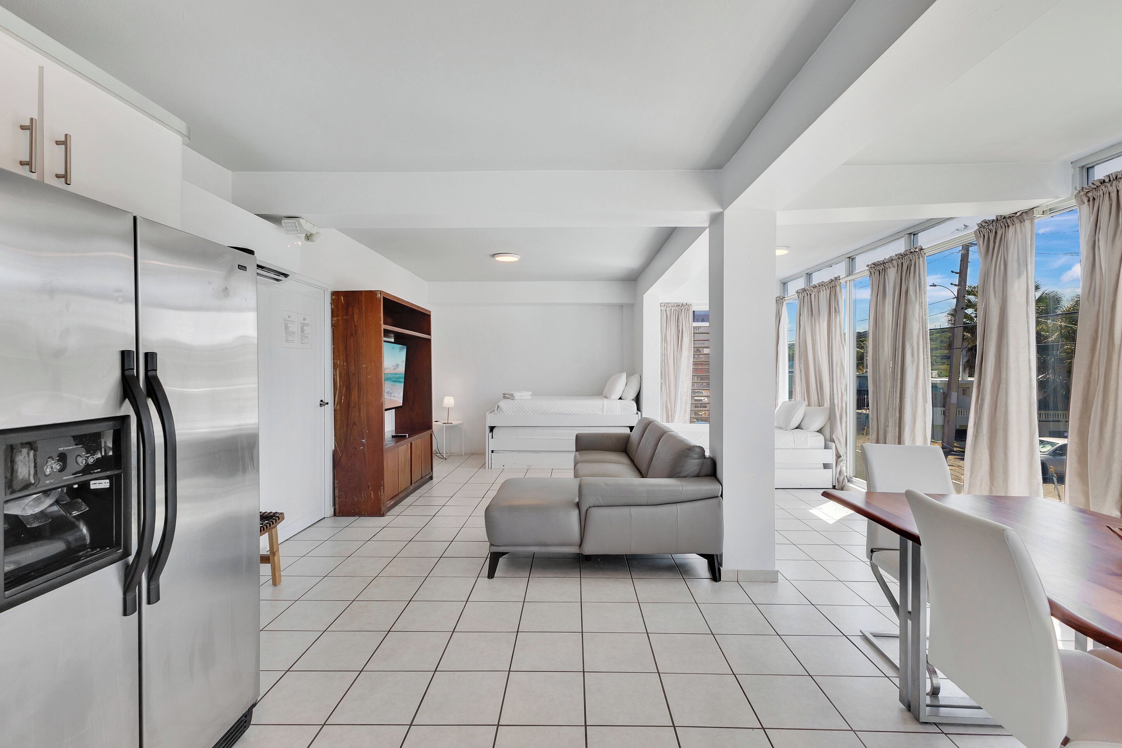 family studio suite | living area | 55-inch lcd tv with digital channels, tv