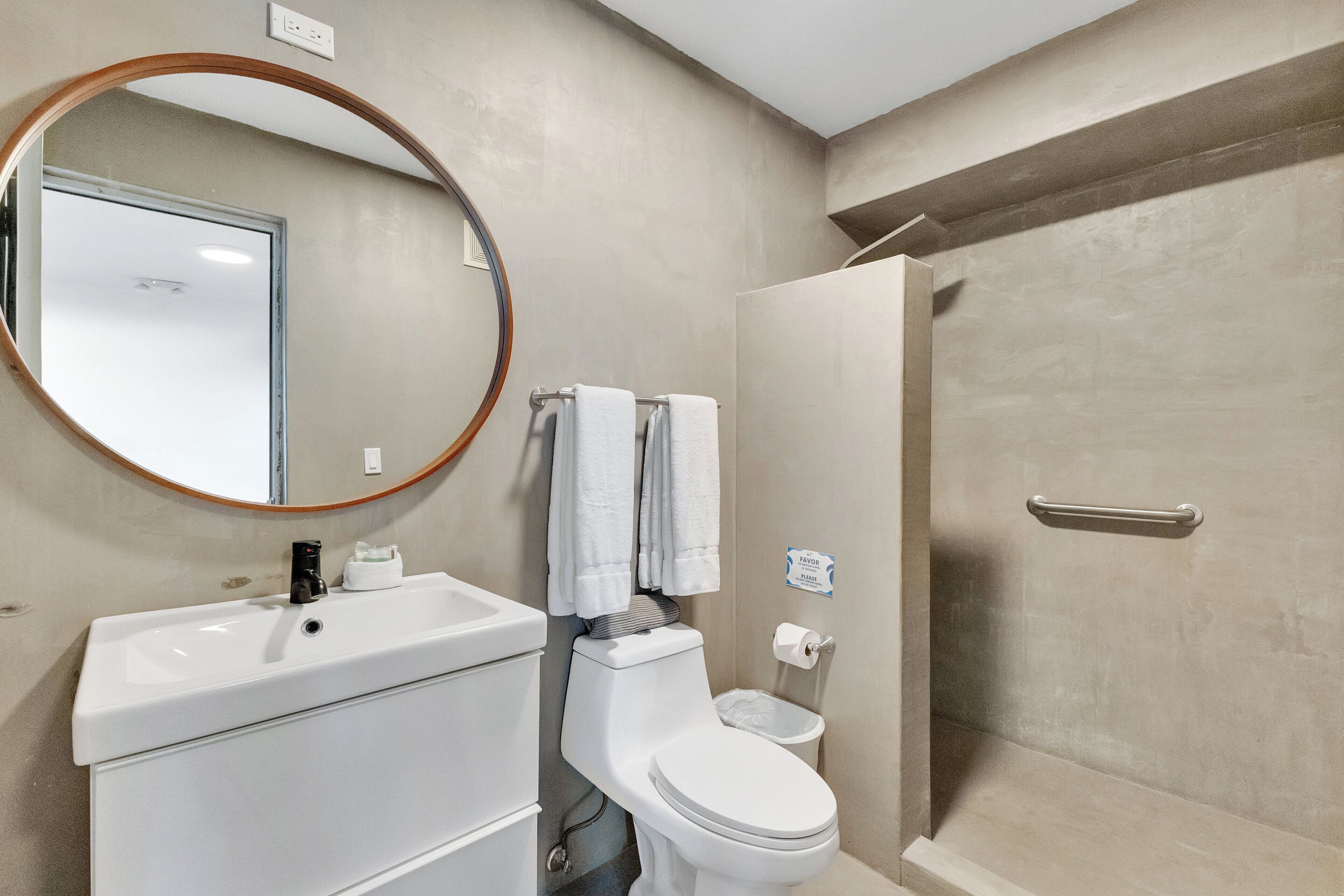 family studio suite | bathroom | shower, towels