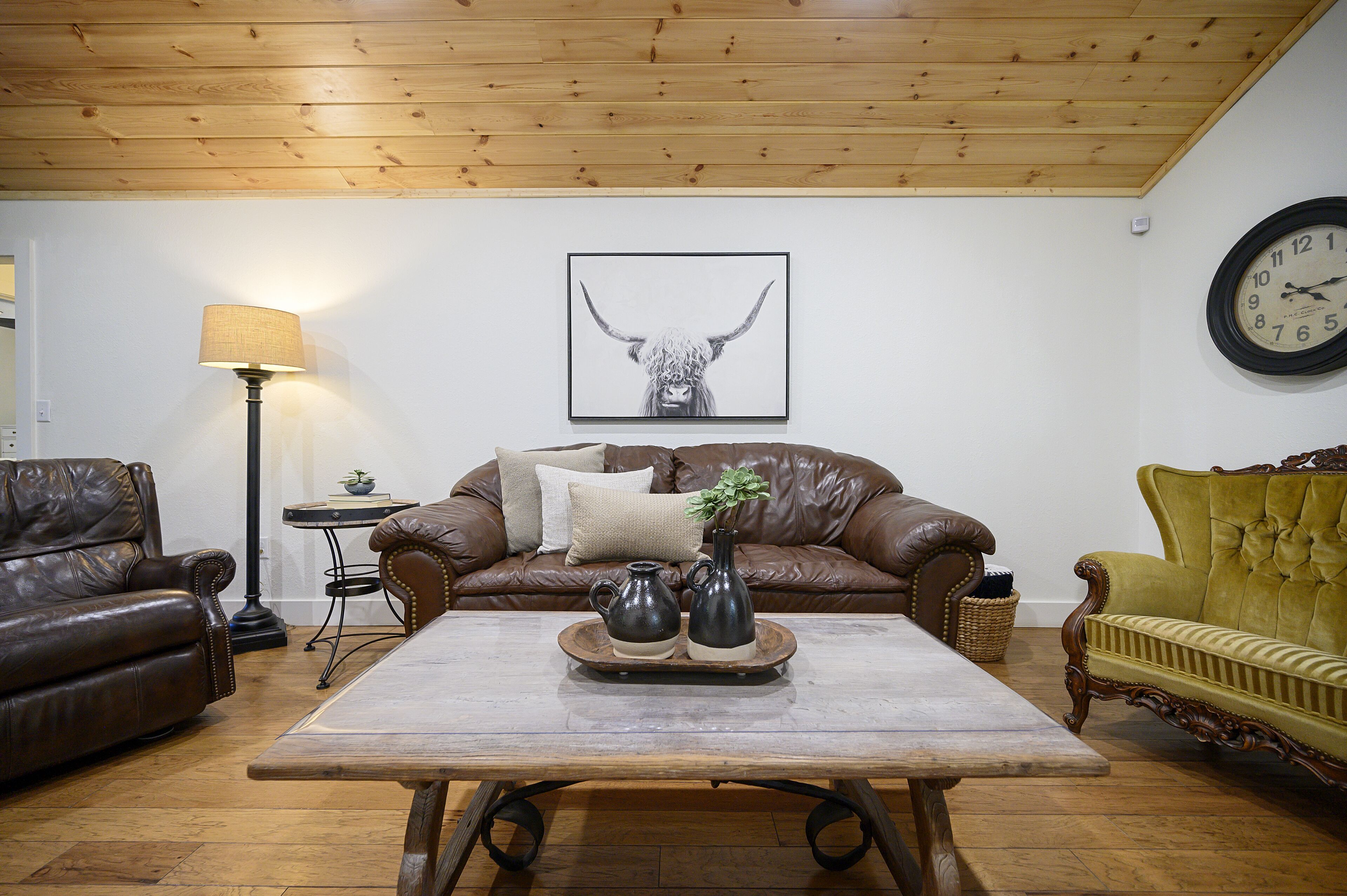 Secluded 4 bedroom farmhouse nestled on 8 acres with large lawn and oak trees. 