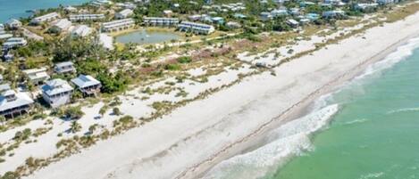 On the beach, sun loungers, beach towels