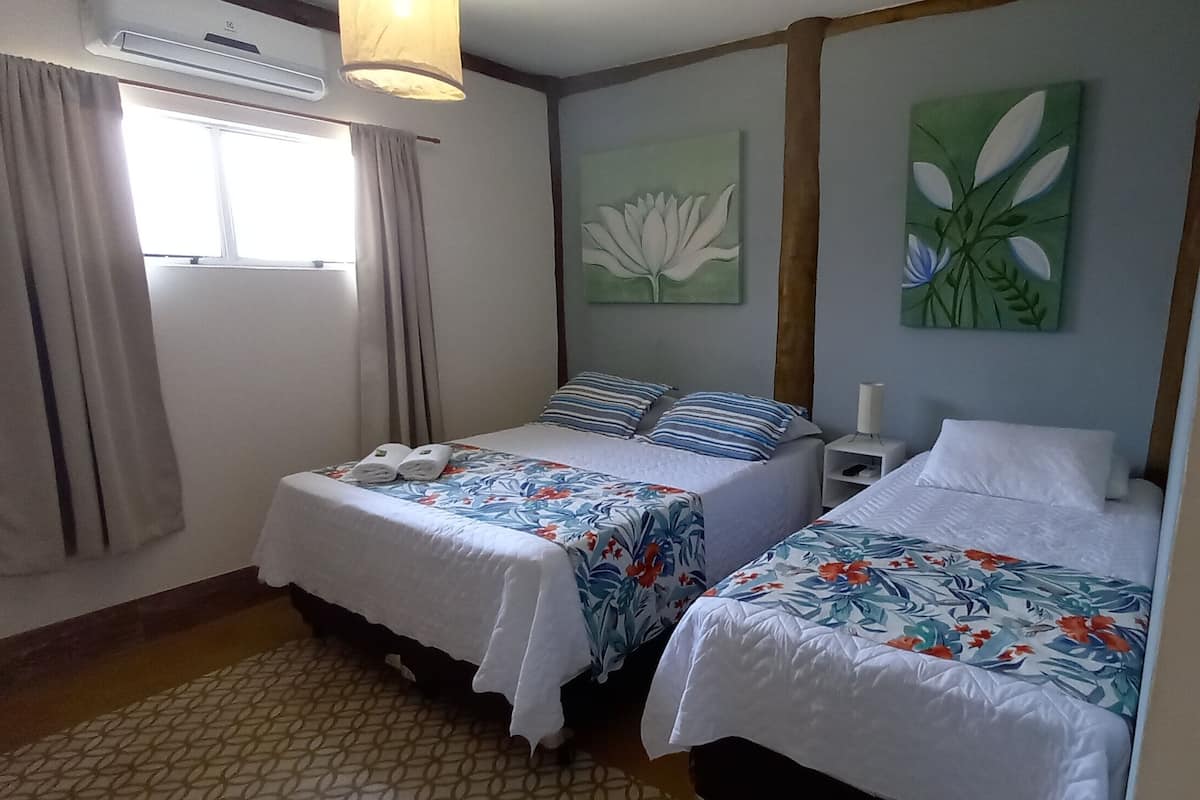 Kamar Triple Comfort | Tirai kedap cahaya dan Wi-Fi gratis