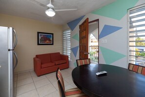 Suite estudio Deluxe | Área de sala de estar