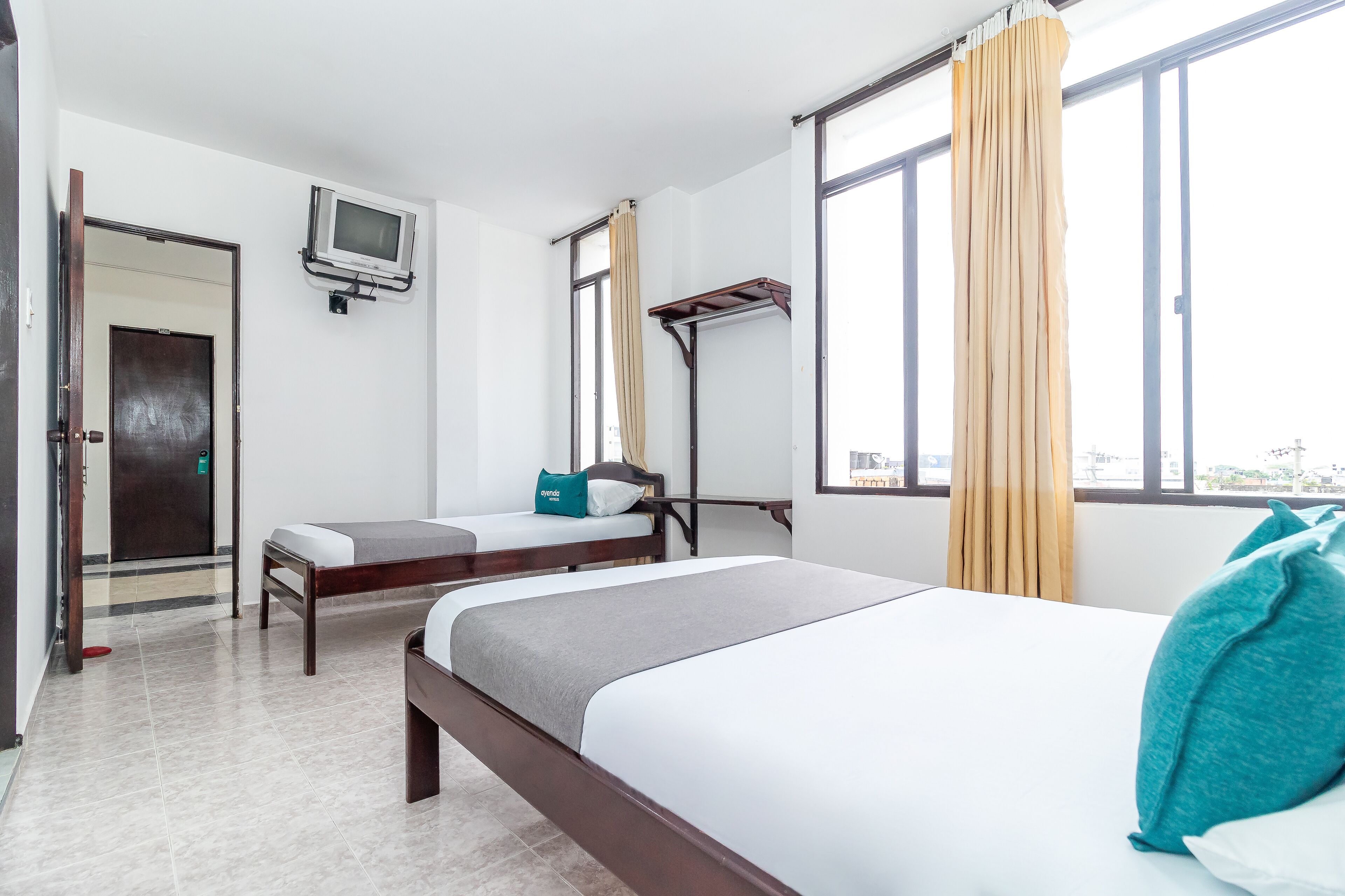 Fan Triple Room | Allergikerbettwaren, kostenloses WLAN, Bettwäsche