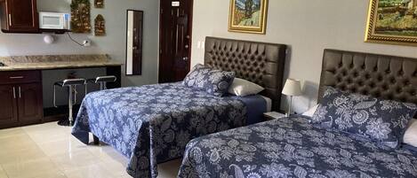 1 chambre, fer et planche Ă repasser, Wi-Fi gratuit, draps fournis