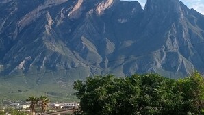 A mountain landscape with a clear sky. - ANTIQUE Garcia (Garcia)
