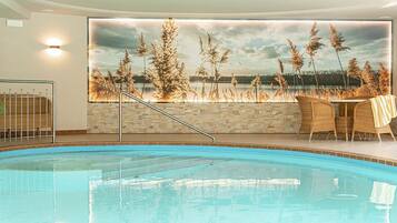 Alberca techada y alberca climatizada