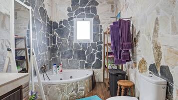 Bathtub, hair dryer, towels