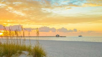 On the beach, sun-loungers, beach towels