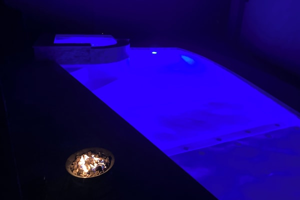 Fire pit and LED mood lighting for the heated pool and spa