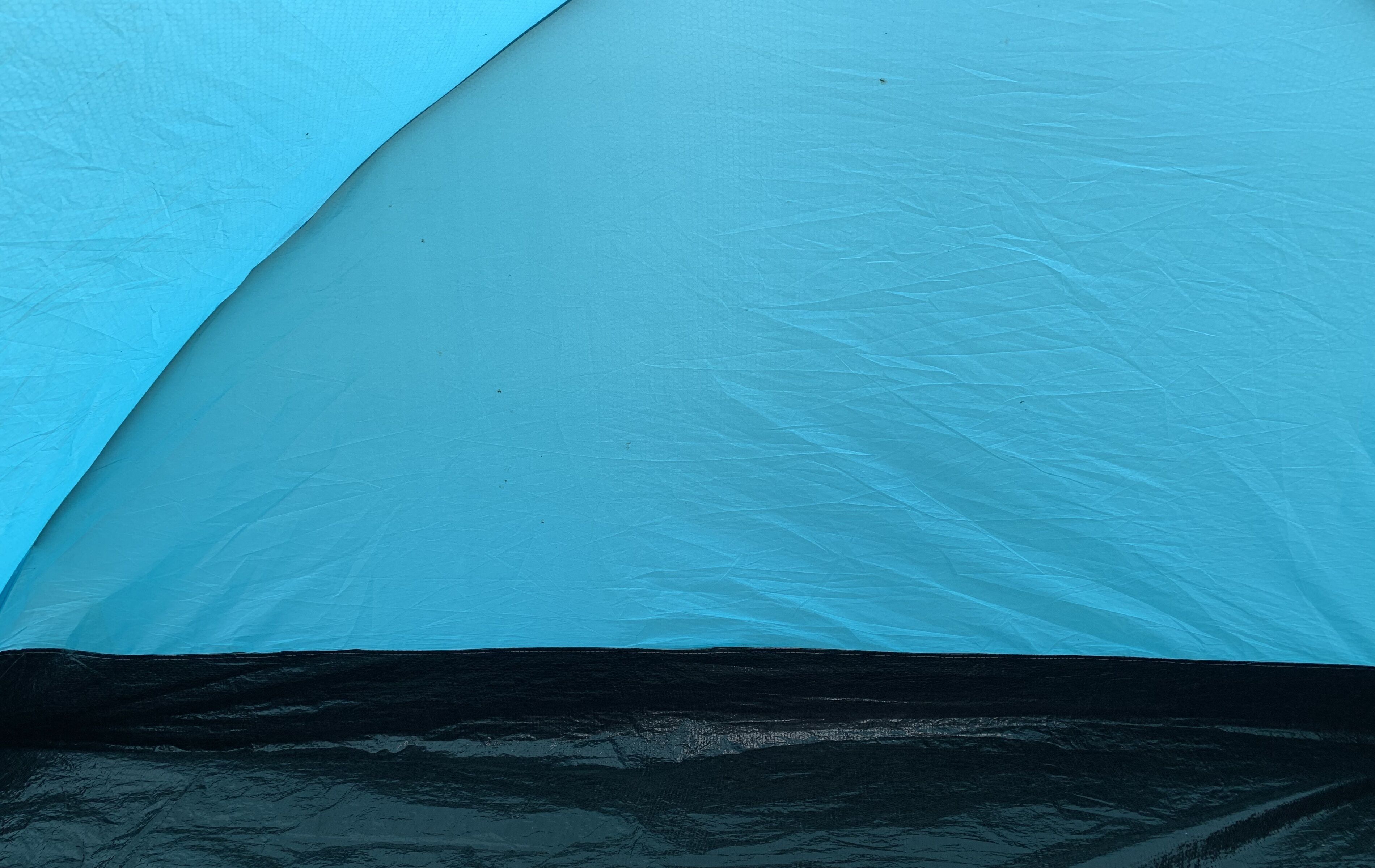 A tent with a blue and black color scheme.
