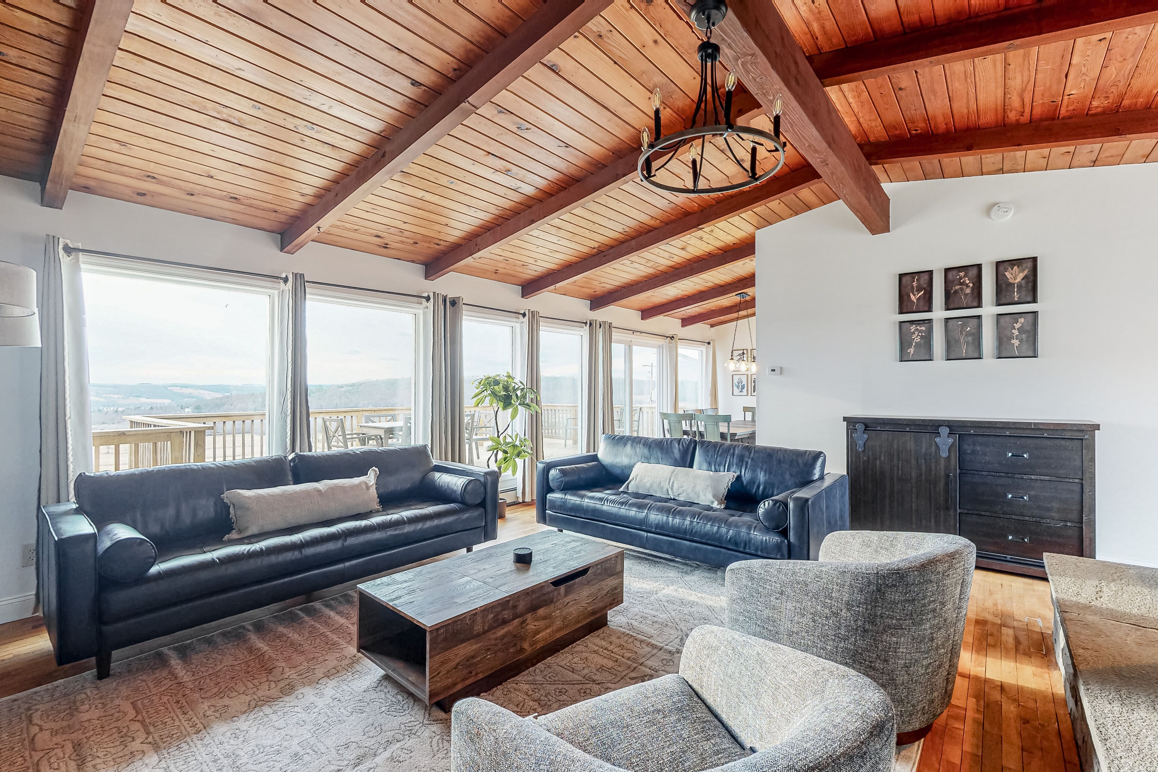 Lake-view countryside haven with deck, two kitchens, fireplace, firepit & AC