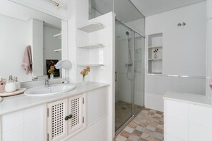 Shower, hair dryer, towels, soap
