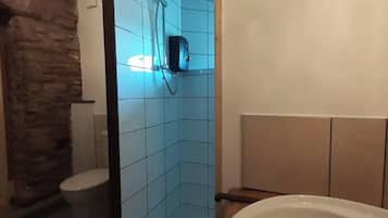 Shower, towels, soap, toilet paper