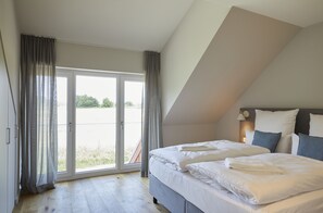 Apartment, 3 Bedrooms | Iron/ironing board, free WiFi, bed sheets - Bades Huk (Hohenkirchen)