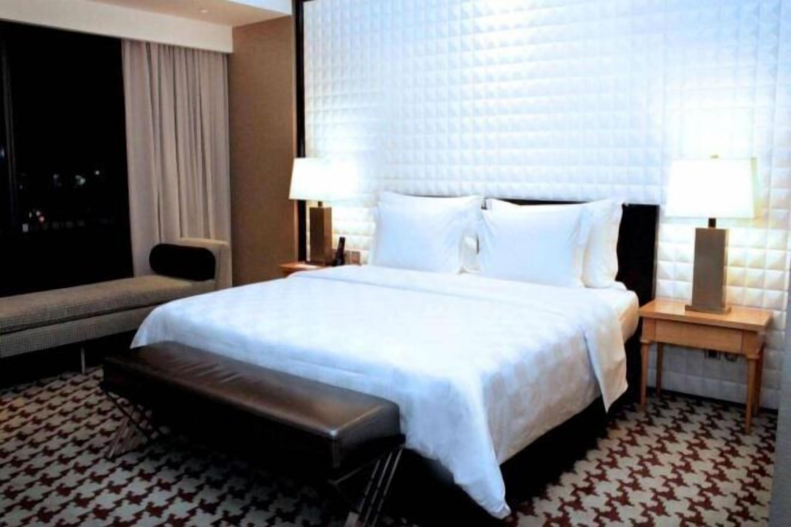 Minibar, desk, blackout drapes, iron/ironing board