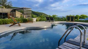 Outdoor pool, pool umbrellas, sun loungers