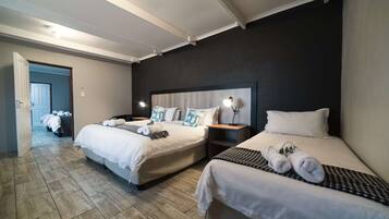 Desk, laptop workspace, free WiFi, bed sheets