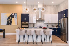 Fridge, microwave, oven, stovetop - Premium Home w/ Hero Theme BR, Secret Gaming RM, Theater & Pool - Near Disney (Davenport)