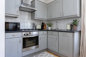Microwave, dishwasher, coffee/tea maker, toaster
