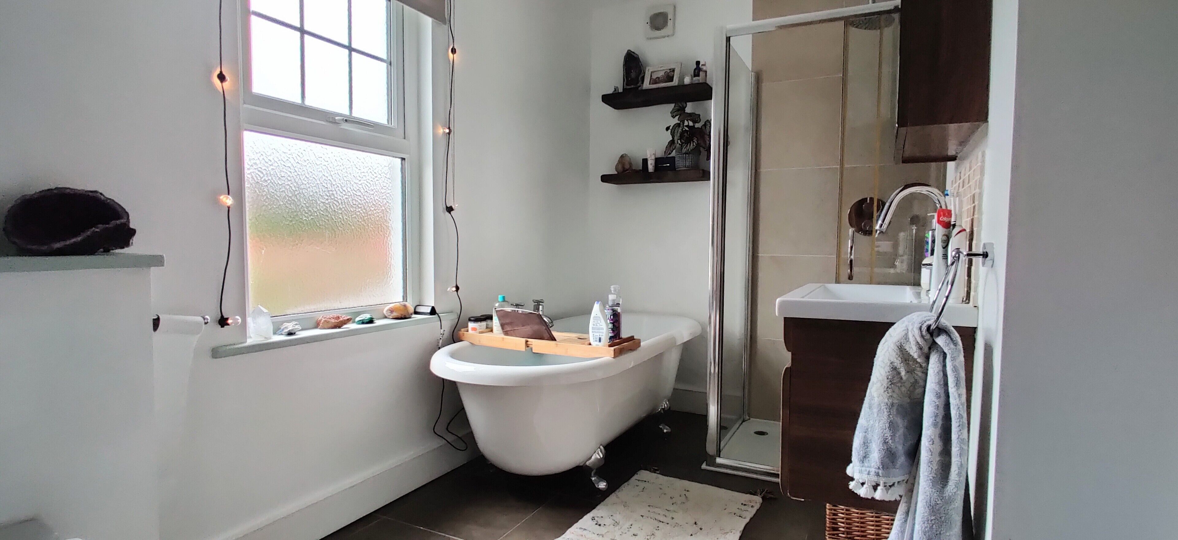 Bathtub, hair dryer, towels, soap