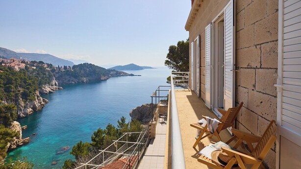 A balcony with a view of a coastal town and the sea. - Hedera Estate, Hedera A30 (Dubrovnik)