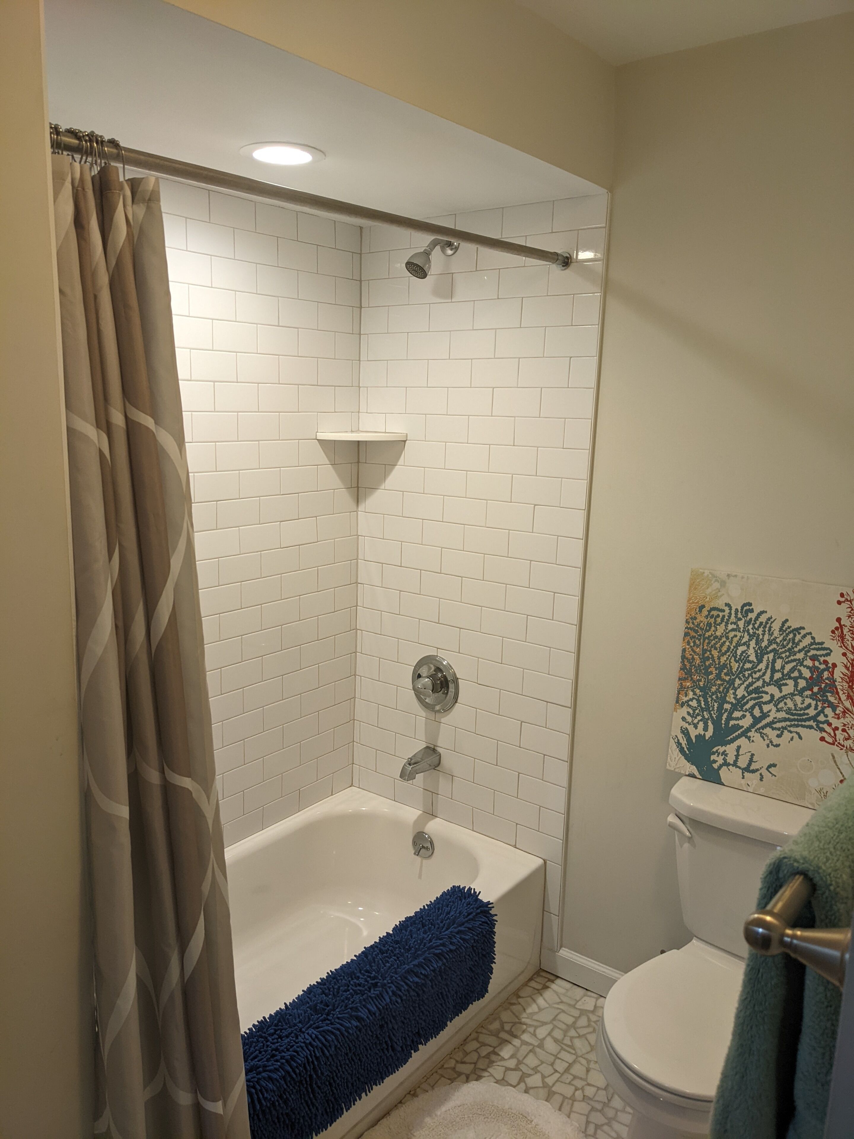 Combined shower/tub, hair dryer, towels, soap