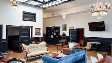 The Grand Chamber - Suite 12 | Living area | 55-inch flat-screen TV with satellite channels, TV, fireplace