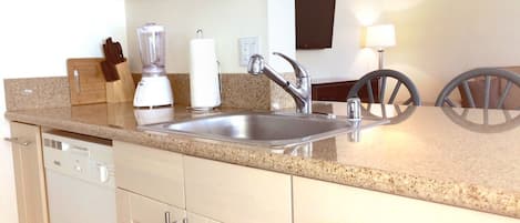 Microwave, dishwasher, coffee/tea maker, cookware/dishes/utensils