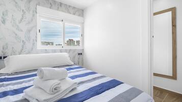 1 dormitorio, tabla de planchar con plancha, wifi gratis y ropa de cama
