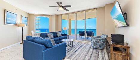 Signature Condo, 3 Bedrooms, Balcony, Ocean View | Living room | 65-inch Smart TV with cable channels, TV