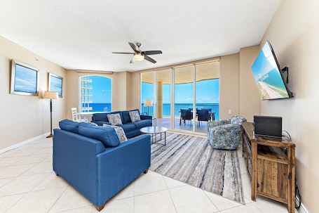 Signature Condo, 3 Bedrooms, Balcony, Ocean View | Living room | 65-inch Smart TV with cable channels, TV